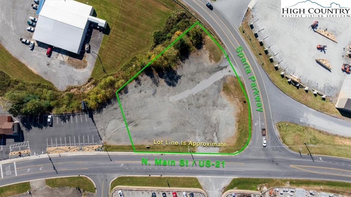 an aerial view of house with yard