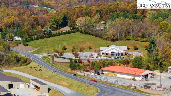 an aerial view of residential houses and outdoor space