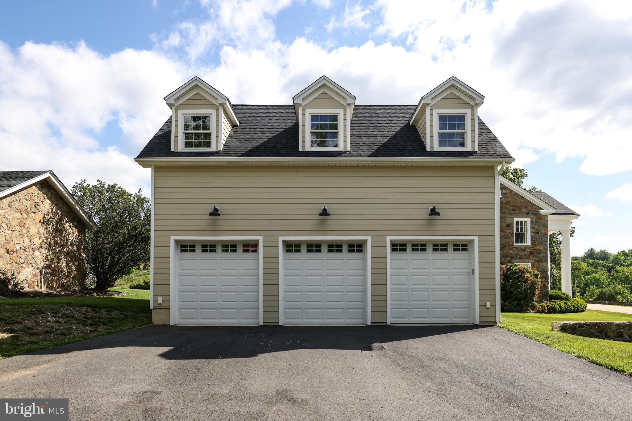 17781 Roxbury Hall Road Leesburg, VA 20175 - Photo 79 of 107 front view of a house with a garage
