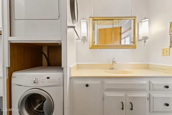 a view of entryway with washer and dryer