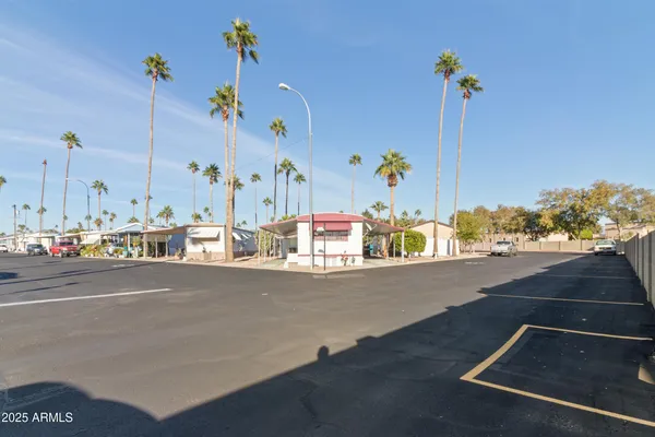 a view of a chairs and table in the patio