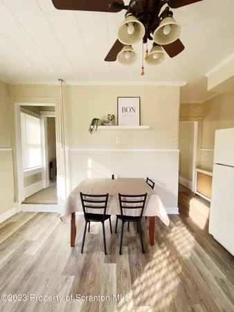 a view of a dining room with furniture