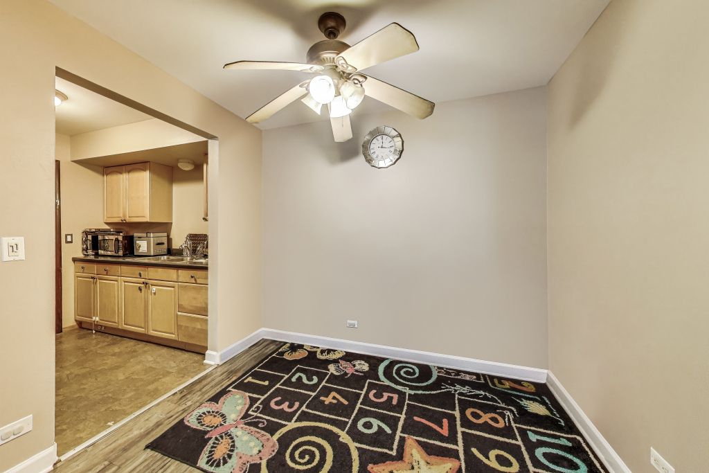 5113 North East River Road, Unit 1M Chicago, IL 60656 - Photo 20 of 25 a view of a kitchen with a sink and dishwasher