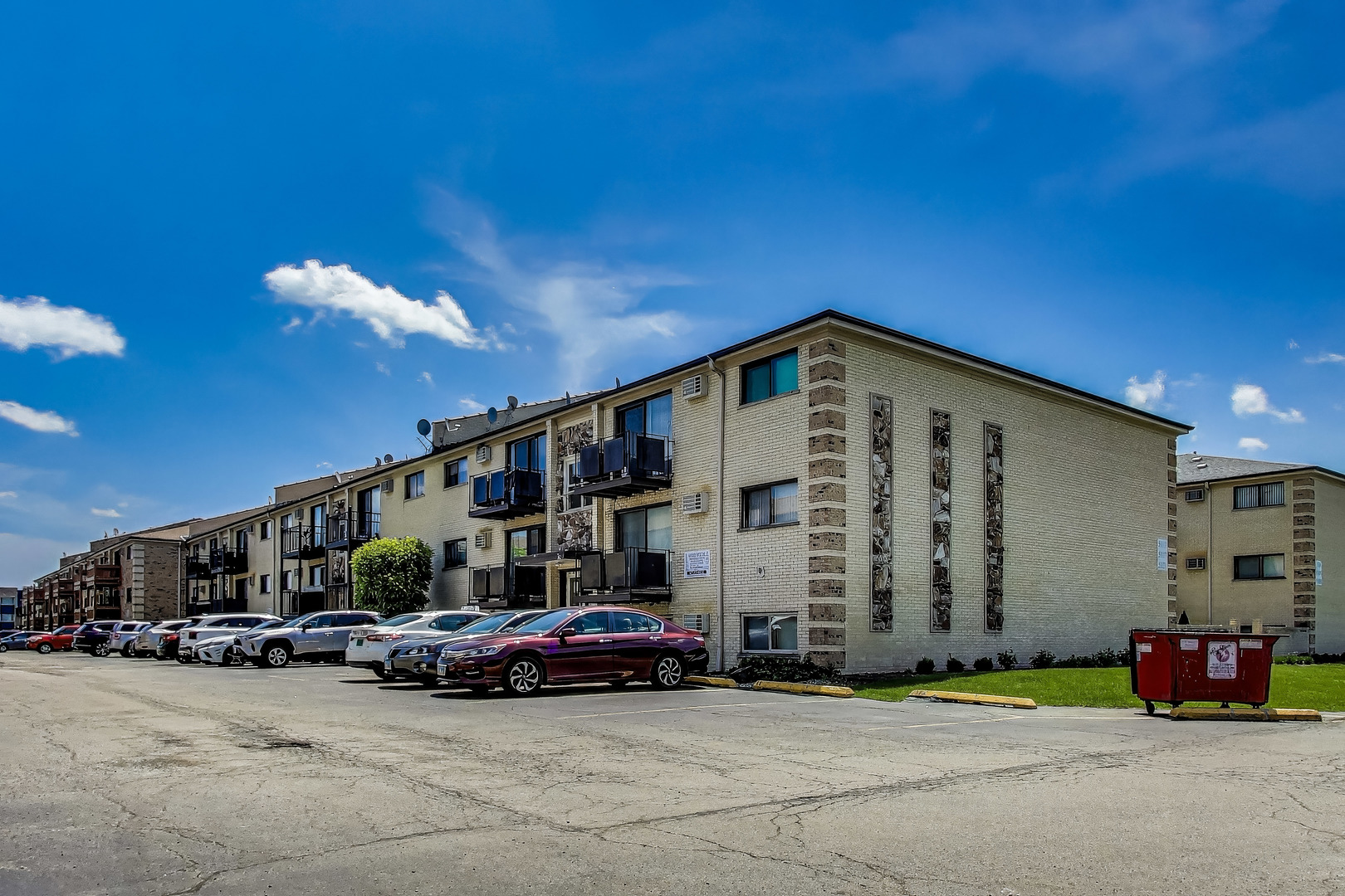 5113 North East River Road, Unit 1M Chicago, IL 60656 - Photo 4 of 25 a car parked in front of building