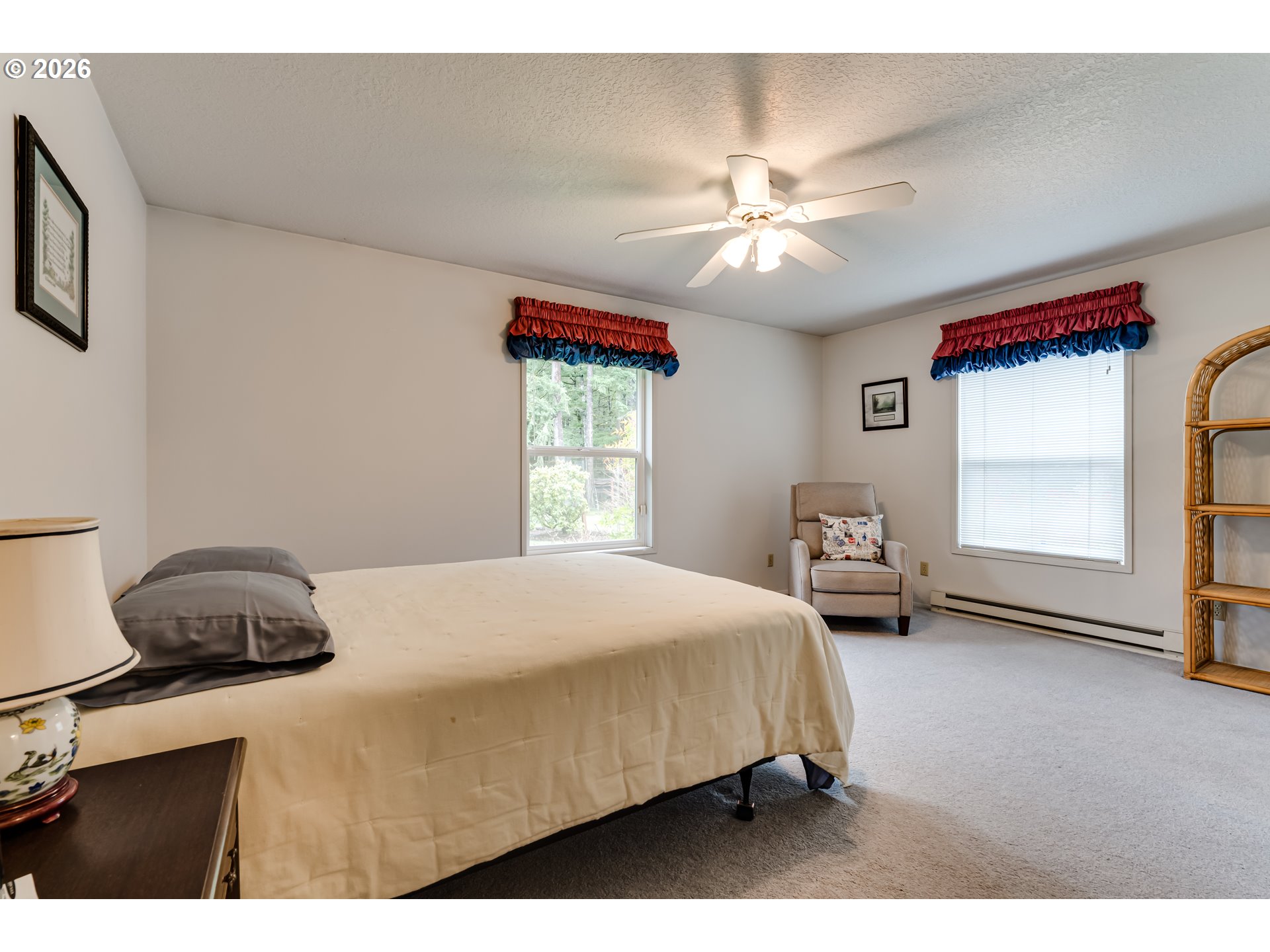 87919 Huston Road Veneta, OR 97487 - Photo 18 of 32 a bedroom with a bed and a window