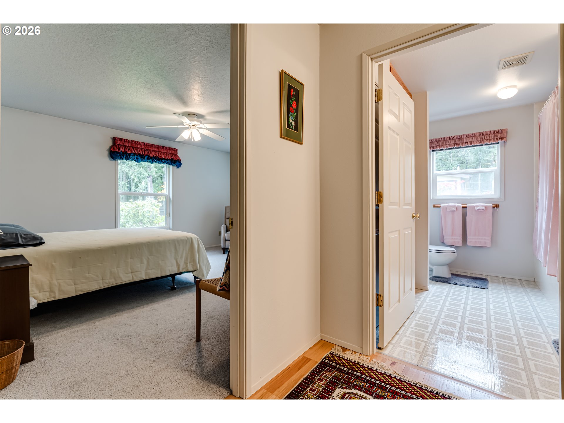87919 Huston Road Veneta, OR 97487 - Photo 19 of 32 a bedroom with a bed and a window