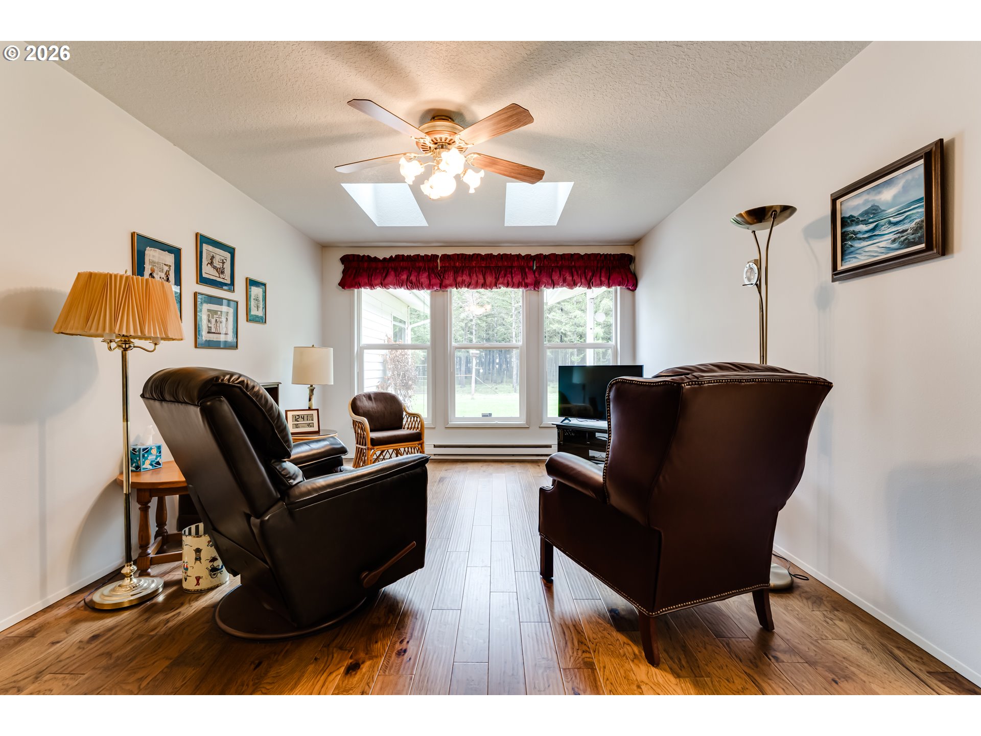 87919 Huston Road Veneta, OR 97487 - Photo 21 of 32 a living room with furniture and a large window