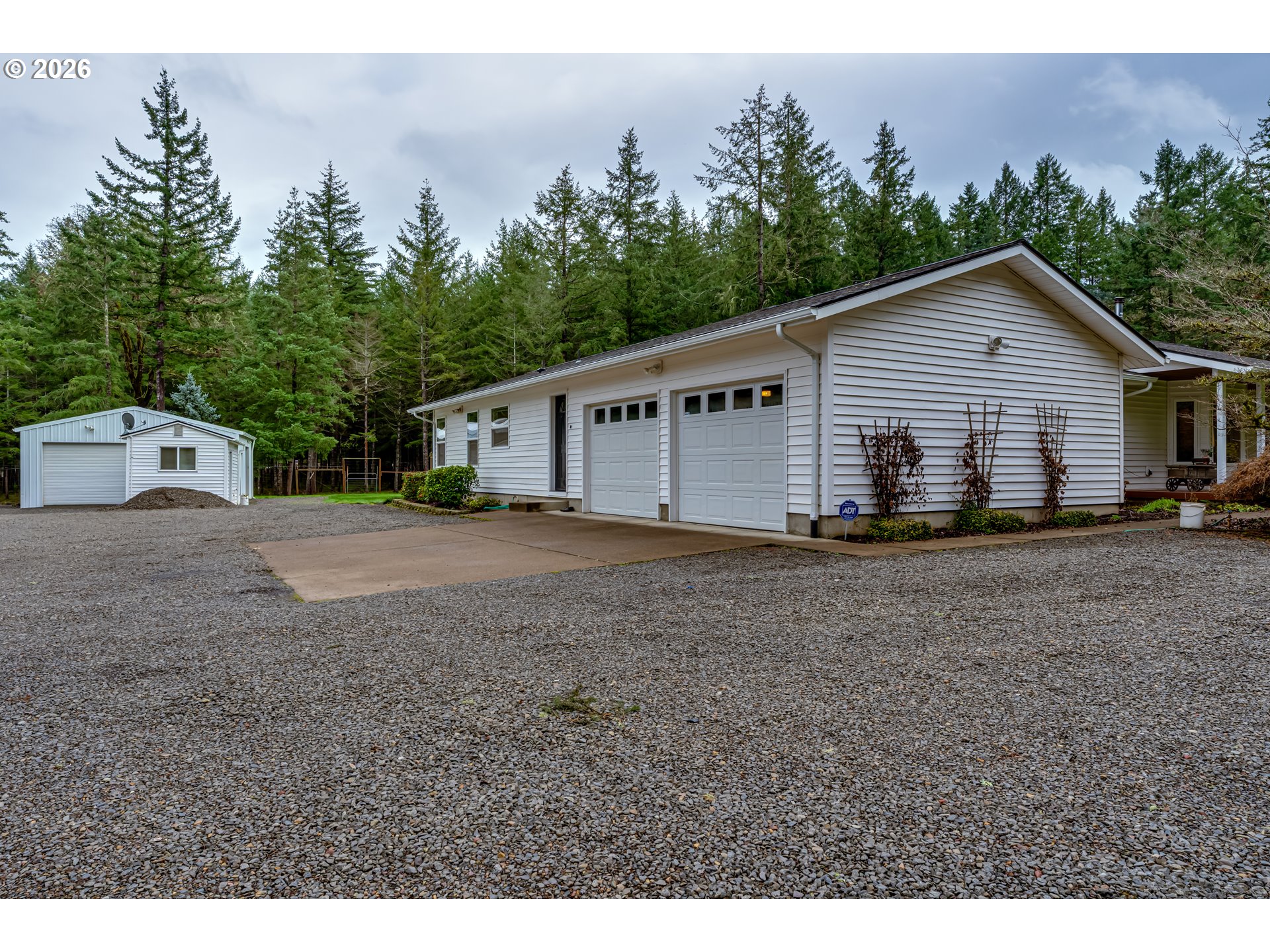 87919 Huston Road Veneta, OR 97487 - Photo 27 of 32 a view of a house with a backyard