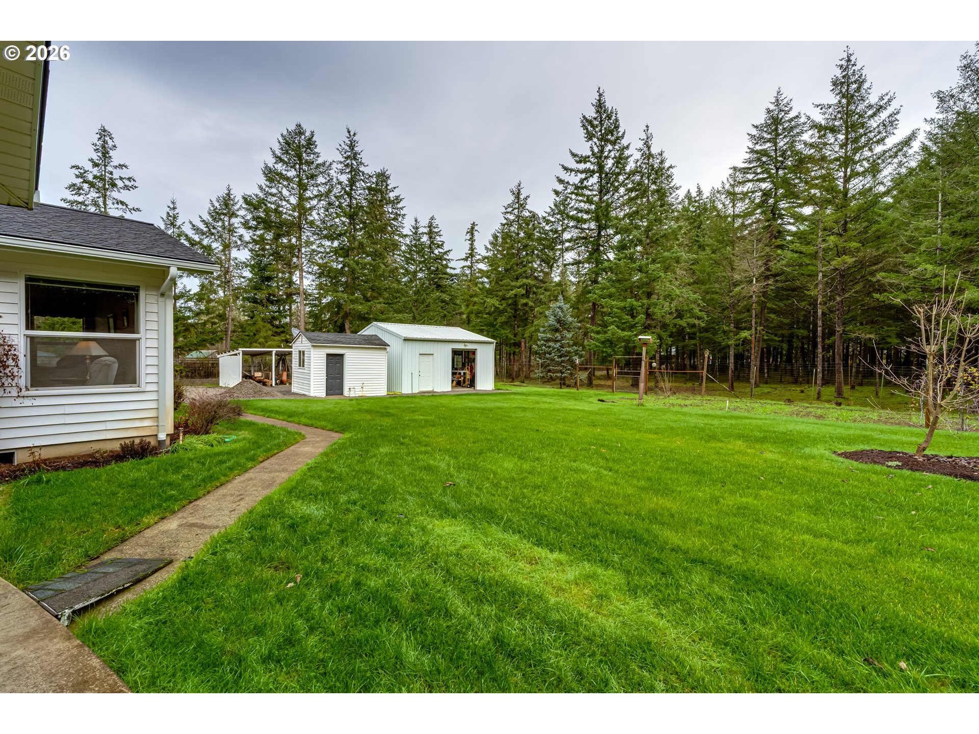 87919 Huston Road Veneta, OR 97487 - Photo 29 of 32 a view of a house with a backyard