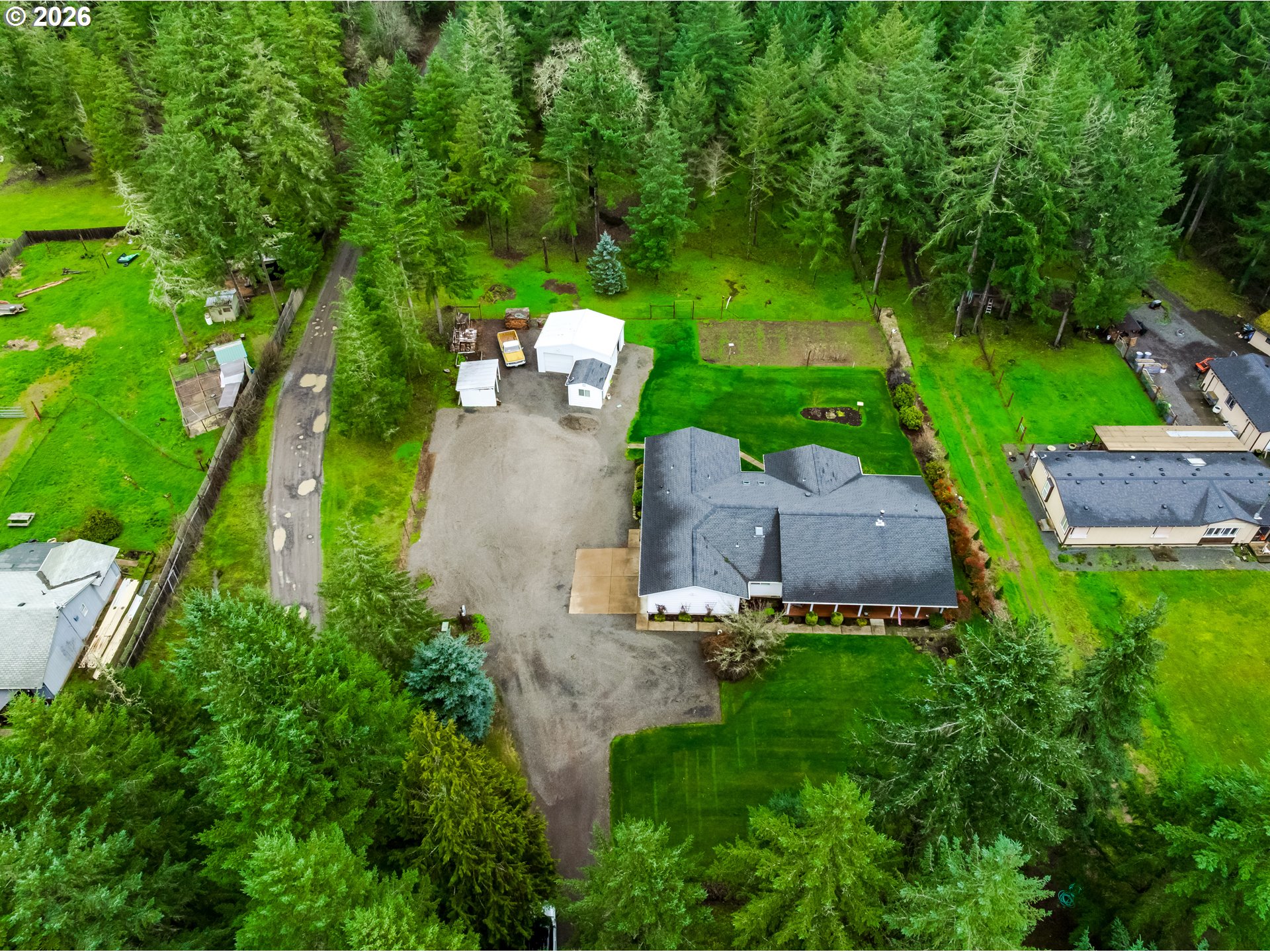 87919 Huston Road Veneta, OR 97487 - Photo 30 of 32 an aerial view of a house with a garden