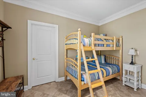 a bathroom with a double vanity sink mirror and toilet
