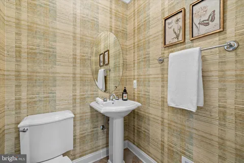 an aerial view of a houses with a lake view