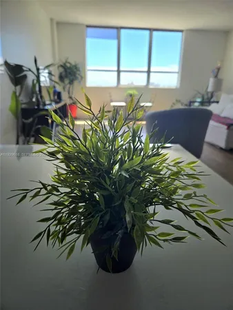 a vase of flowers sitting on a table