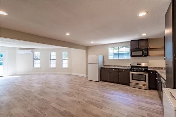 a view of a kitchen with a sink