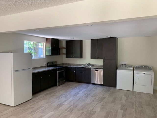 1412 Vargas Road, Unit B Austin, TX 78741 - Photo 9 of 10 a view of a kitchen with a sink