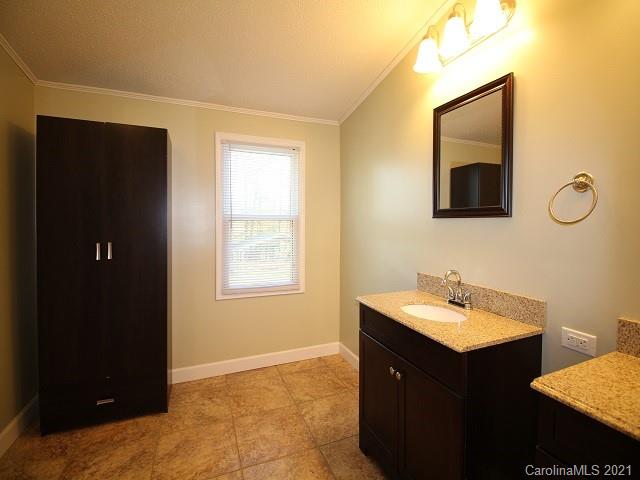 1255 Goldmine Road Chester, SC 29706 - Photo 13 of 23 a bathroom with a sink and a mirror
