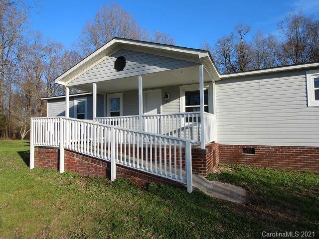 1255 Goldmine Road Chester, SC 29706 - Photo 3 of 23 a front view of a house with a yard