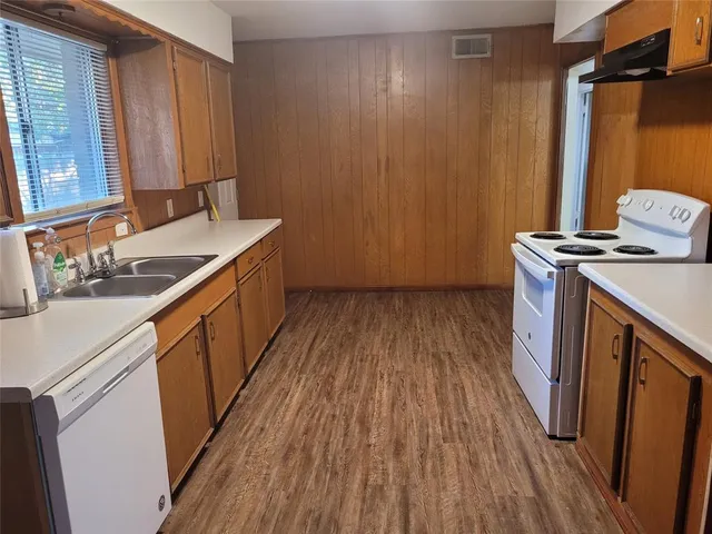 a storage room with wooden floor
