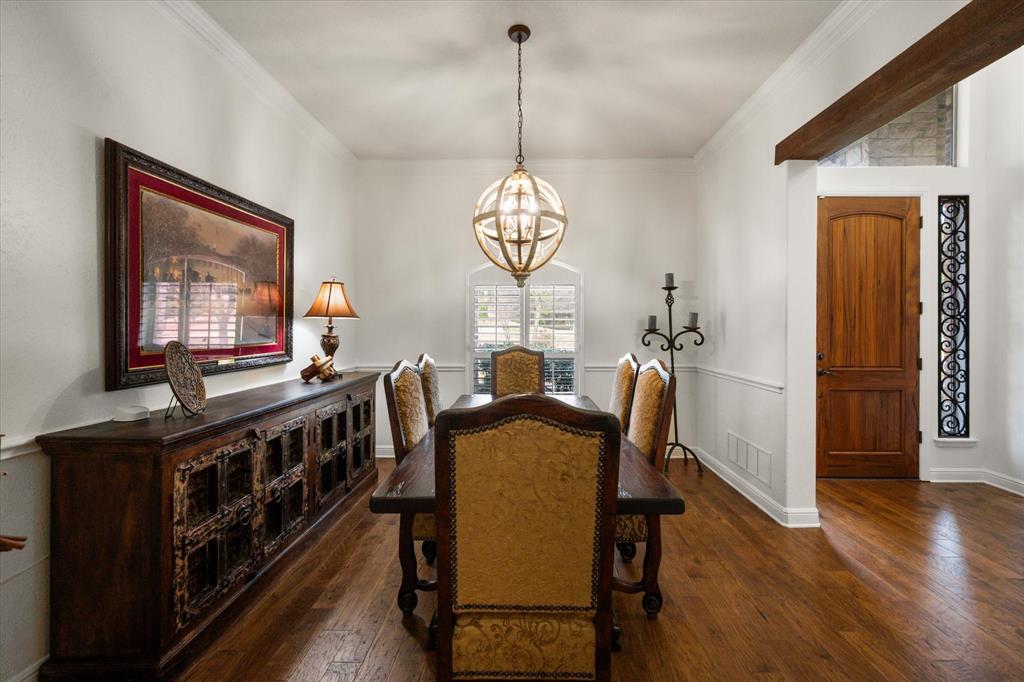 3840 Angela Court Midlothian, TX 76065 - Photo 12 of 40 a view of a dining room with furniture window and wooden floor