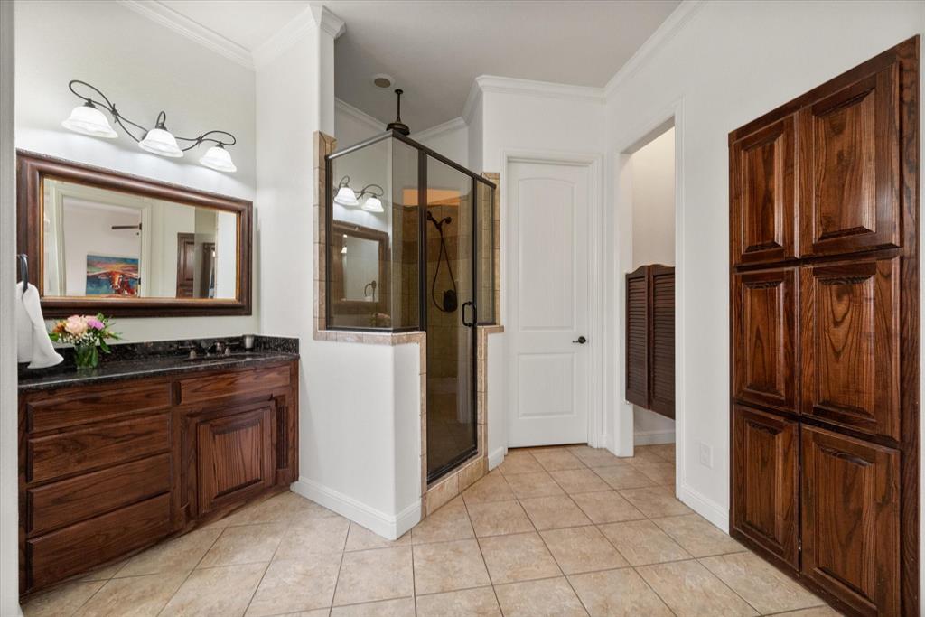 3840 Angela Court Midlothian, TX 76065 - Photo 21 of 40 a kitchen with stainless steel appliances granite countertop a refrigerator and a sink