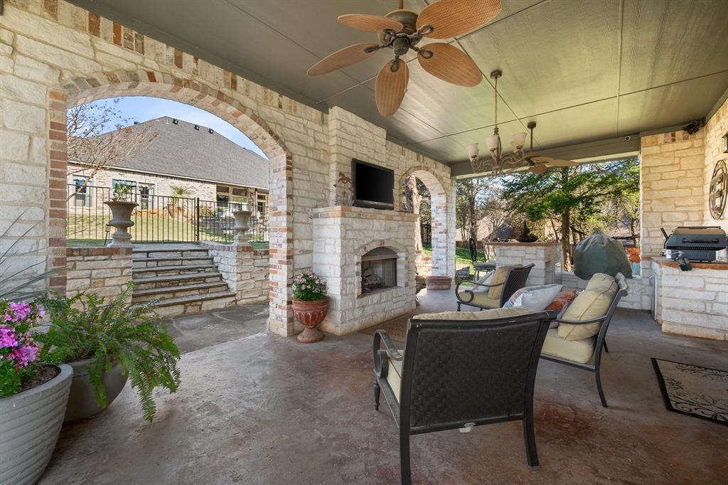3840 Angela Court Midlothian, TX 76065 - Photo 35 of 40 a living room with furniture and a fireplace