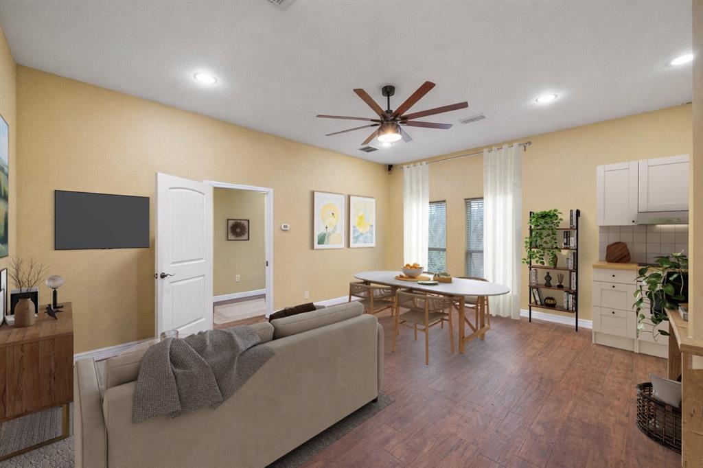 3840 Angela Court Midlothian, TX 76065 - Photo 37 of 40 a living room with furniture wooden floor and a large window