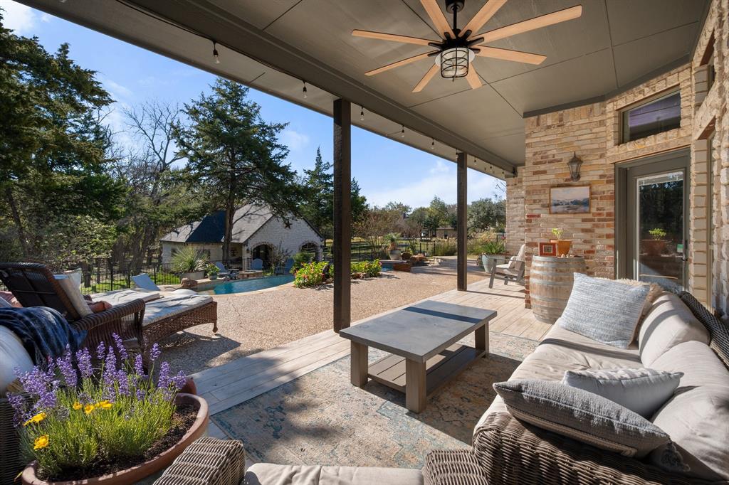 3840 Angela Court Midlothian, TX 76065 - Photo 6 of 40 a building outdoor space with patio furniture and potted plants