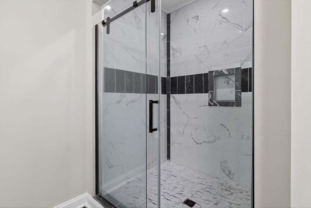 338 Mt Zion Road Oxford, GA 30054 - Photo 22 of 33 a bathroom with a shower