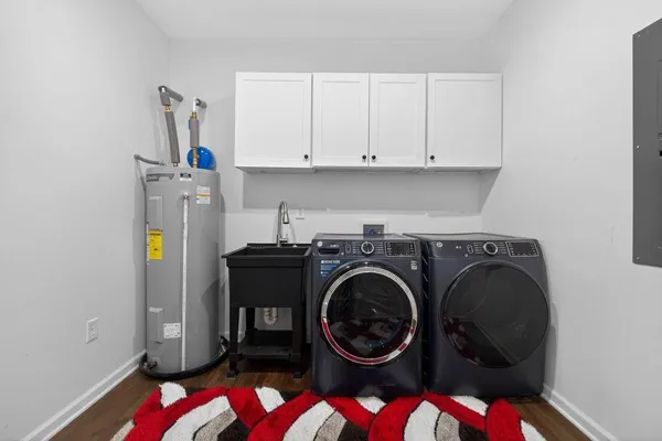 a utility room with dryer and washer