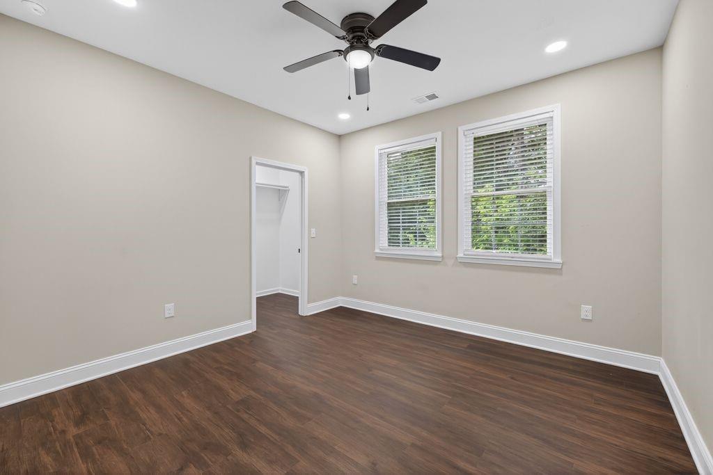 338 Mt Zion Road Oxford, GA 30054 - Photo 27 of 33 wooden floor in an empty room with a window