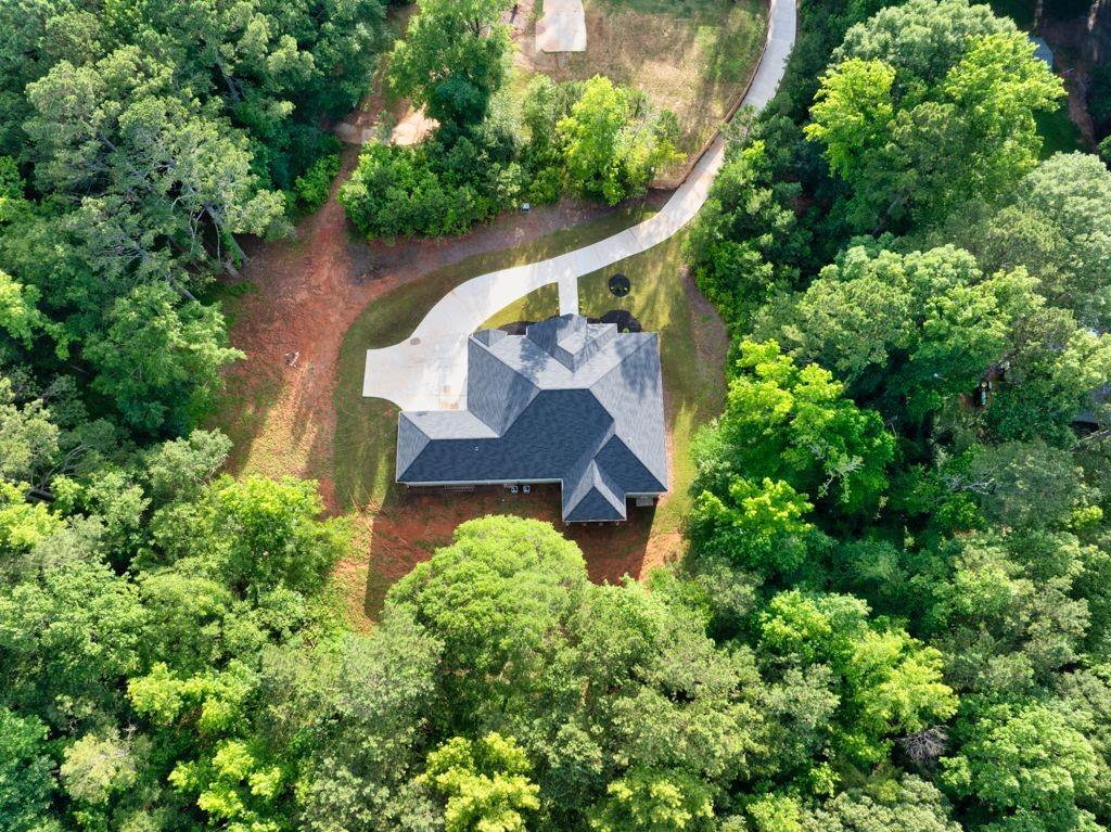 338 Mt Zion Road Oxford, GA 30054 - Photo 3 of 33 an aerial view of a house with a yard and garden