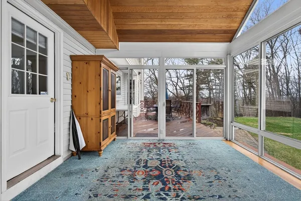 a view of a porch with furniture