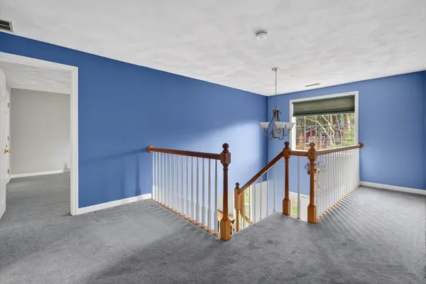 a view of a hallway with window