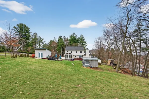 an aerial view of a house with outdoor space