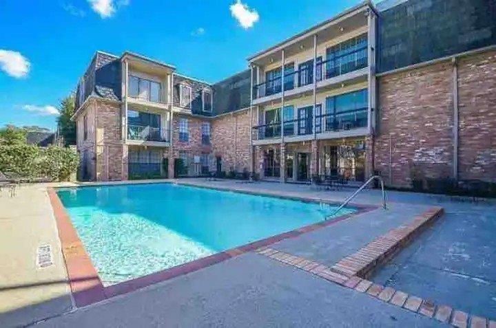 2425 Underwood Street, Unit 346 Houston, TX 77030 - Photo 28 of 30 a view of building with a yard