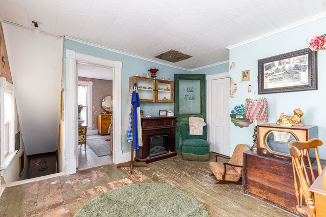 3261 South Daysville Road Oregon, IL 61061 - Photo 45 of 72 a living room with furniture and a fireplace