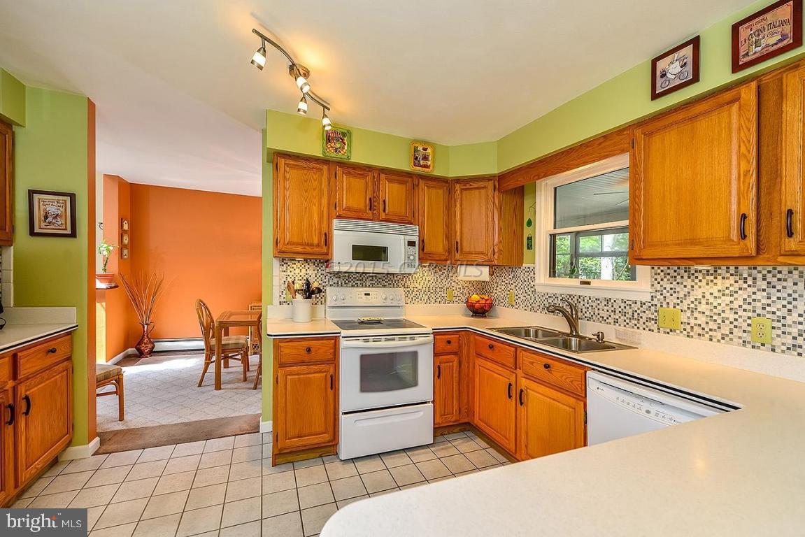 29 Moonraker Road Berlin, MD 21811 - Photo 22 of 54 a kitchen with a sink appliances and cabinets