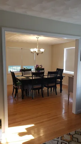 a view of a dining room with furniture