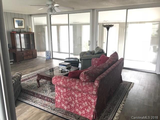 291 Potter Road Lancaster, SC 29720 - Photo 12 of 31 a living room with furniture large window and wooden floor