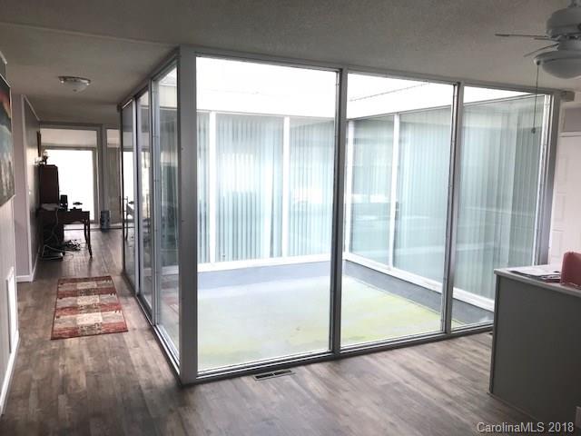 291 Potter Road Lancaster, SC 29720 - Photo 15 of 31 a view of empty room with floor to ceiling window