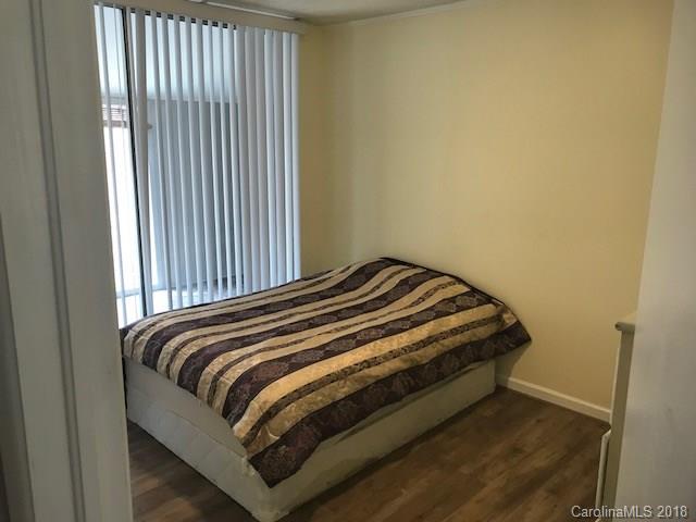 291 Potter Road Lancaster, SC 29720 - Photo 19 of 31 a bed sitting in a bedroom next to a window