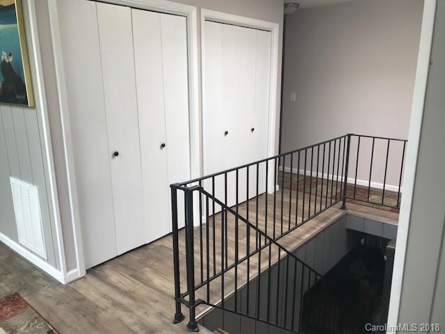 291 Potter Road Lancaster, SC 29720 - Photo 23 of 31 a view of a hallway with wooden floor