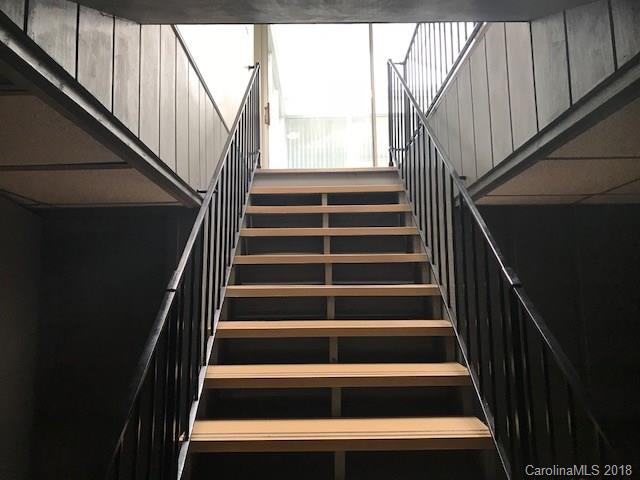 291 Potter Road Lancaster, SC 29720 - Photo 24 of 31 a view of staircase with wooden floor and white walls