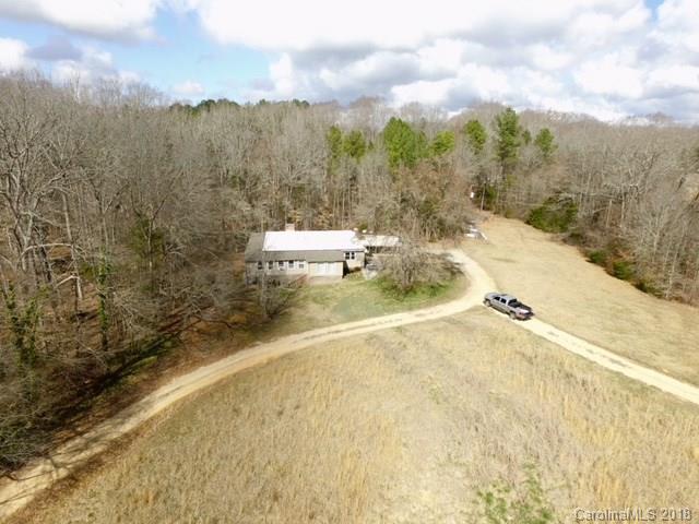 291 Potter Road Lancaster, SC 29720 - Photo 7 of 31 a view of a swimming pool with a yard