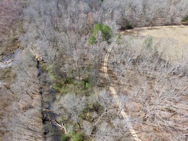 291 Potter Road Lancaster, SC 29720 - Photo 10 of 31 a view of a dry yard with trees