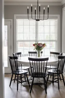 a kitchen with a stove and cabinets