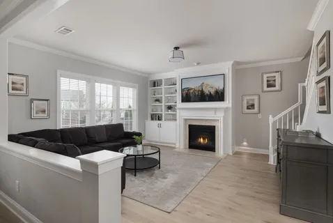 a view of hall way with furniture and entryway