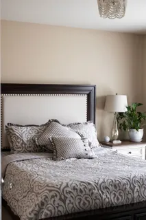 a view of a patio with table and chairs and garden