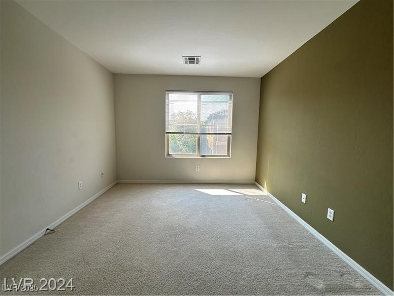 4650 Ranch House Road, Unit 95 North Las Vegas, NV 89031 - Photo 41 of 50 Empty room featuring carpet and baseboards