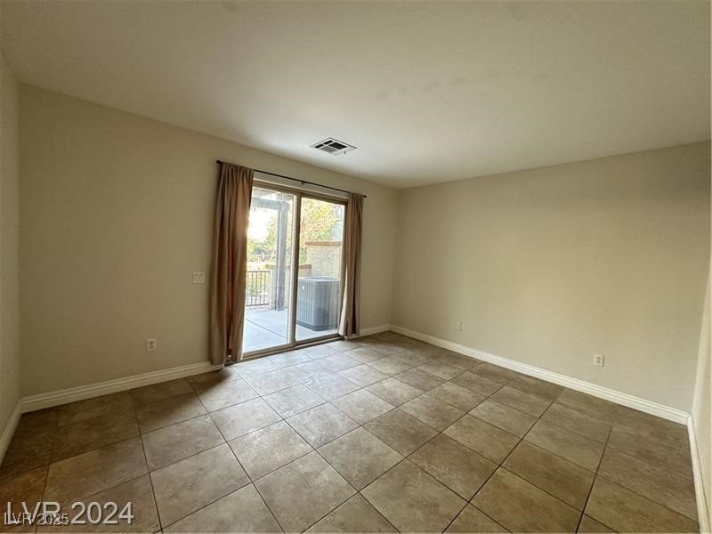 4650 Ranch House Road, Unit 95 North Las Vegas, NV 89031 - Photo 46 of 50 Unfurnished room with baseboards and light tile patterned flooring
